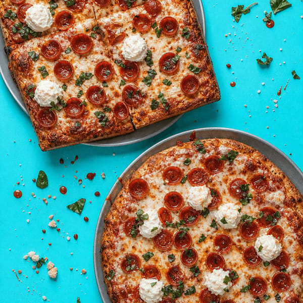 Freshly baked Pesto Roni pizza from Zack's Pizza and BBQ.